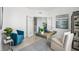 Stylish office with glass desk, comfortable seating, and natural light, perfect for working from home at 31458 Paper Birch St, Wesley Chapel, FL 33545