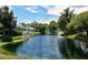 Scenic lake view within the Southwinds Five Lakes community, surrounded by lush landscaping and serene homes at 3520 51St W Ave, Bradenton, FL 34210