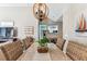 Spacious dining area featuring a rustic chandelier and a view into living room at 3520 51St W Ave, Bradenton, FL 34210