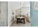 Dining area showcasing a chandelier and decor for a coastal aesthetic at 3520 51St W Ave, Bradenton, FL 34210