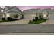Charming townhome featuring a well-manicured lawn and a two-car garage at 3520 51St W Ave, Bradenton, FL 34210