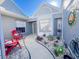 Inviting home entrance with decorative gravel and vibrant landscaping at 3520 51St W Ave, Bradenton, FL 34210