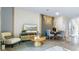 Cozy living room and dining area with sleek decor and natural light create an inviting and modern space at 3637 Copper Beech Dr, Land O Lakes, FL 34638