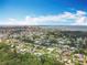 An aerial view of a residential community with lush trees and views of the water at 3900 38Th S St, St Petersburg, FL 33711