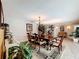 Dining room with chandelier and view into living area at 3900 38Th S St, St Petersburg, FL 33711