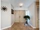 Foyer with double doors, tile flooring, and natural light at 3900 38Th S St, St Petersburg, FL 33711