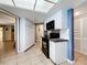 The kitchen features tiled floors, modern appliances, and ample cabinet space for storage at 3900 38Th S St, St Petersburg, FL 33711