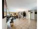Living space shows flow into the dining room at 3900 38Th S St, St Petersburg, FL 33711