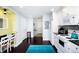 Bright kitchen featuring white cabinets and modern appliances at 399 2Nd St # 417, Indian Rocks Beach, FL 33785