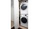 Convenient in-unit laundry closet with stacked washer and dryer at 399 2Nd St # 417, Indian Rocks Beach, FL 33785