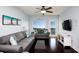 Cozy living room with contemporary furnishings and view of the river at 399 2Nd St # 417, Indian Rocks Beach, FL 33785