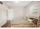 Inviting bedroom with natural light, sleek flooring, and comfortable decor at 4406 W Harbor View Ave, Tampa, FL 33611