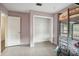 Shared bedroom featuring bunk beds, an open closet, and access to other rooms at 4406 W Harbor View Ave, Tampa, FL 33611