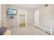 Well-lit bedroom with wood floors, a comfortable bed, and a closet at 4406 W Harbor View Ave, Tampa, FL 33611