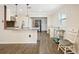 Bright, updated kitchen with granite countertops, stainless steel appliances, and modern lighting at 4406 W Harbor View Ave, Tampa, FL 33611