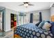 Comfortable bedroom with a view to the backyard and closet area at 4406 W Harbor View Ave, Tampa, FL 33611