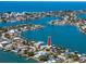 An aerial view of waterfront home in a serene coastal community at 474 20Th Ave, Indian Rocks Beach, FL 33785