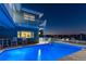 Backyard at dusk featuring a pool and private dock at 474 20Th Ave, Indian Rocks Beach, FL 33785