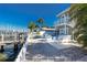 An outdoor space featuring a patio, pool, and private dock with water access at 474 20Th Ave, Indian Rocks Beach, FL 33785