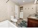 Bathroom with double vanity, shower and toilet at 474 20Th Ave, Indian Rocks Beach, FL 33785
