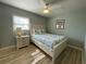 Bright bedroom with bed and bedside table at 474 20Th Ave, Indian Rocks Beach, FL 33785