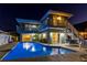 Exterior of the house featuring the pool and balconies with outdoor seating and canal views at 474 20Th Ave, Indian Rocks Beach, FL 33785
