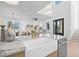 Bright and open kitchen featuring stone countertops and stainless steel appliances at 5120 3Rd N Ave, St Petersburg, FL 33710