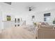 Upstairs living room filled with natural light showcases the comfortable seating area at 5120 3Rd N Ave, St Petersburg, FL 33710