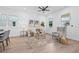 Bright and spacious living room with hardwood floors, a comfortable seating area, and large windows at 5120 3Rd N Ave, St Petersburg, FL 33710