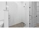 Walk-in shower with frameless glass enclosure and tiled walls at 5120 3Rd N Ave, St Petersburg, FL 33710
