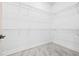 Spacious walk-in closet with white walls, gray flooring, and wire shelving at 5120 3Rd N Ave, St Petersburg, FL 33710