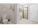 Well-lit bathroom with sleek glass shower and modern fixtures at 520 Valri Park Dr, Valrico, FL 33594