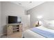 Comfortable bedroom with a ceiling fan and a TV, perfect for relaxation at 520 Valri Park Dr, Valrico, FL 33594