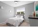 Charming bedroom with a soft bed, neutral colors, and natural light at 520 Valri Park Dr, Valrico, FL 33594