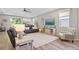Bright living room showcasing modern furnishings, wood-look floors and neutral color palette at 520 Valri Park Dr, Valrico, FL 33594