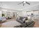 Open-concept living area with modern furnishings, connecting the kitchen, living, and dining spaces at 520 Valri Park Dr, Valrico, FL 33594