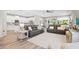 Spacious living room that flows into the kitchen and dining area, creating an open, airy feel at 520 Valri Park Dr, Valrico, FL 33594