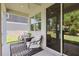Covered patio features ceiling fan, modern furniture and view of the backyard at 520 Valri Park Dr, Valrico, FL 33594