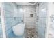 Newly renovated bathroom featuring a sleek freestanding tub, glass shower, and modern fixtures at 5215 Denver Ne St, St Petersburg, FL 33703