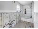 Bathroom undergoing renovation, featuring a new bathtub and tile, ready to become a spa-like retreat at 5215 Denver Ne St, St Petersburg, FL 33703