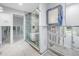 Modern bathroom renovation showcases a freestanding tub, glass shower, and stylish fixtures with framing at 5215 Denver Ne St, St Petersburg, FL 33703