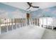 Cozy bedroom featuring a ceiling fan and creative cloud and star wallpaper, ready to be transformed into a room at 5215 Denver Ne St, St Petersburg, FL 33703