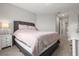 Main bedroom featuring carpet, a queen bed, night stand and ensuite bathroom access at 5270 Neil Dr, St Petersburg, FL 33714
