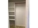 White closet with shelves and clothes rod for extra storage at 5530 80Th N St # A306, St Petersburg, FL 33709