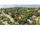 Neighborhood aerial view with mature trees, some water in the background and a home location marker at 5901 3Rd S St, St Petersburg, FL 33705