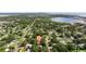 City aerial view of a residential area with a lake in the background at 5901 3Rd S St, St Petersburg, FL 33705