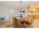 Dining room featuring bright walls, wood floors, and a contemporary dining set at 5901 3Rd S St, St Petersburg, FL 33705