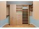 Well-organized walk-in closet with custom built-ins, shelving, and drawer storage at 5901 3Rd S St, St Petersburg, FL 33705