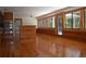 Expansive living area featuring beautiful wood floors and natural light at 6160 Fitzgerald Road, Odessa, FL 33556