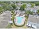 Aerial shot showcasing the community pool and surrounding townhomes at 6249 Osprey Lake Cir, Riverview, FL 33578